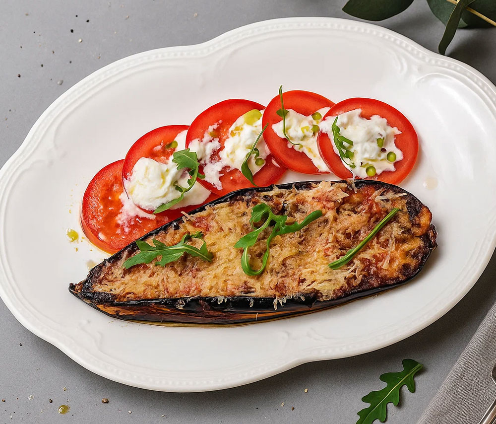 Stuffed eggplant and tomato carpaccio with stracciatella